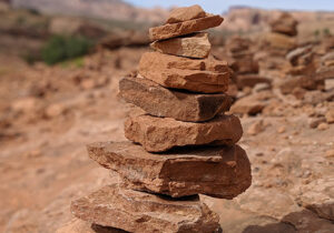 a rock cairn in the desert