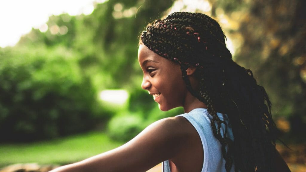 Girl smiling in a park