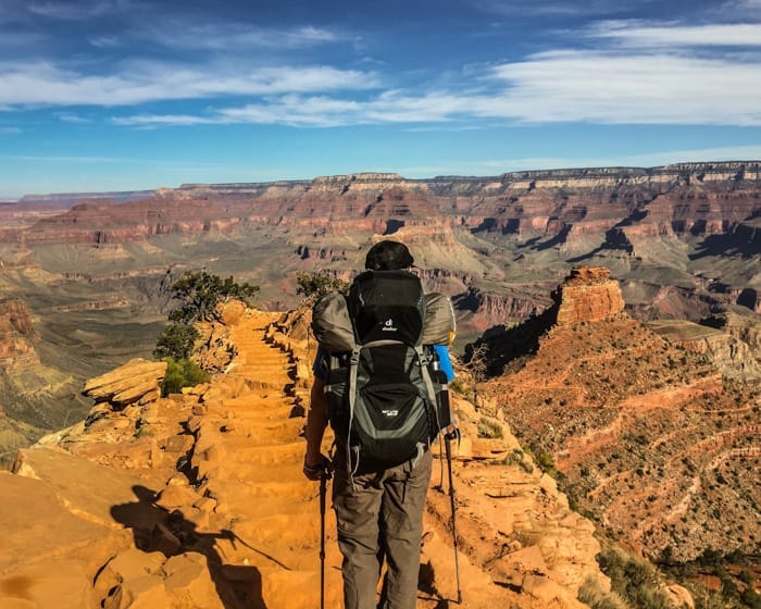 Hiker looking out over a canyon